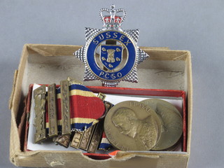 4 LCC School Attendance medals and a Sussex PCSO cap badge