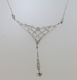 A lady's diamond pendant hung on a fine chain, approx 1.50ct