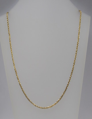 A gilt metal chain marked 14k