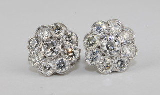A pair of 18ct white gold cluster earrings set set diamonds, approx 1.80ct