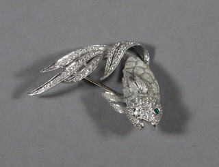 A silver marcasite brooch in the form of a fish
