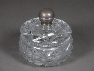 A circular cut glass dressing table jar with silver top 4" and a lady's wristwatch