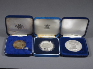 A silver 1972 Duke of Windsor commemorative medallion, a  1981 Charles & Diana silver crown, a 1976 silver proof  American centenary crown