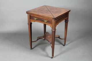 An Edwardian inlaid mahogany envelope card table fitted a  drawer, raised on square tapering supports with undertier 23"w x  23"d x 30"h  ILLUSTRATED