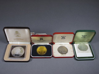 A 1978 Bahamas Anniversary silver 10 dollar proof coin, a 1972  Queens Silver Wedding crown, a 1972 Gibraltar proof crown and a Franklyn Mint Mount Batten of Burma crown