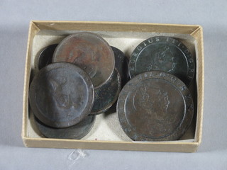 A collection of various cartwheel half pennies