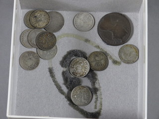 A Victorian silver florin, 12 silver thruppences and 1 other silver  coin