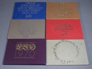 4 proof sets of British coins 1983, 1984, 1985 and 1986