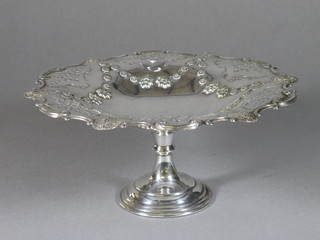 An embossed silver plated pedestal bowl 10"
