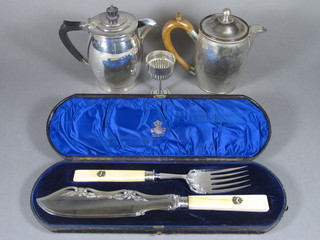 A pair of silver plated fish servers the handles decorated the  Arms of the Worshipful Company of Vintners, cased, together   with 2 silver plated hotwater jugs and a silver plated goblet
