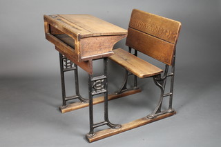 An elm and iron Christs Hospital school bench incorporating a  seat 31 1/2"w x 32"h