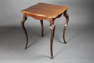 An Edwardian square mahogany occasional table of serpentine outline, raised on cabriole supports 23 1/2"w x 24"d x 26"h