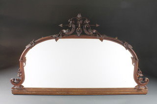 A Victorian D shaped bevelled plate mirror contained in a carved mahogany frame 57"w x 34"h