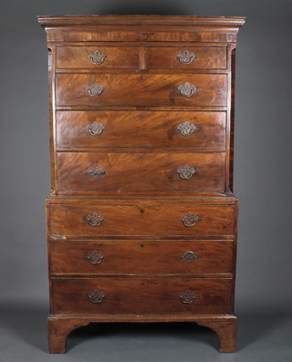 A Georgian mahogany chest on chest, the upper section with moulded and dentil cornice fitted 2 short and 3 long drawers, the  base fitted 3 long drawers with brass swan neck handles, raised  on bracket feet 43"w x 22"d x 74"h  ILLUSTRATED