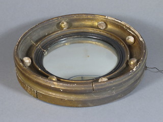 A 19th Century circular convex plate mirror contained in a ball studded frame 10"