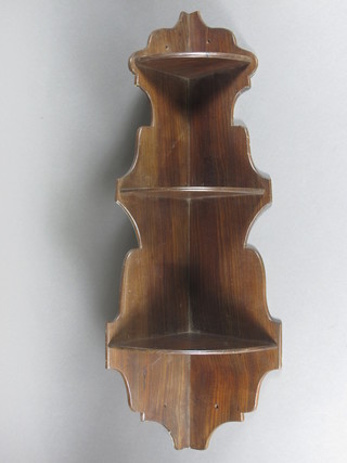A mahogany hanging 3 tier corner shelf unit 10"w x 29"h