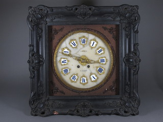 A French striking wall clock with 11" circular dial marked  Rochet Paris contained in a square ebonised case 21"