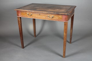 A mahogany writing table with inset tooled brown leather writing  surface fitted 1 long drawer, raised on square tapering supports  36"w x 30"h x 24"d