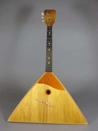 A 3 stringed Balalaika musical instrument