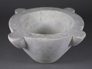A circular carved marble mortar 13"