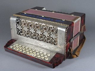 A Tonella accordion with 31 buttons  ILLUSTRATED