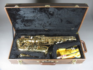 A brass saxophone by Earlham Professional Series 2, cased