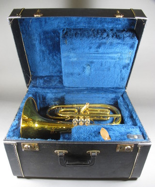 A 3 valved brass tuba type instrument by Kanstul with 10" valve, cased