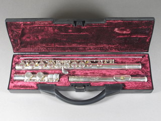 A silver 3 piece flute by Buffet, cased