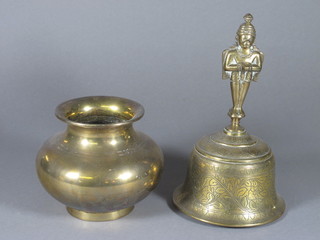 A heavy Eastern brass bell 9" and a do. vase 4"