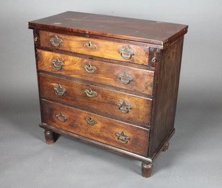 A Georgian mahogany bachelor's chest of 4 long graduated  drawers raised on turned supports 31 1/2"w x 32"h x 15"d