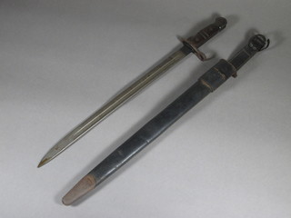 An American Remington bayonet with scabbard