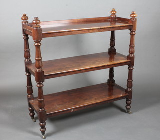 A Victorian mahogany 3 tier buffet raised on turned supports  39"w x 41"h x 15"d
