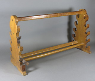 A curious wooden 5 section rack