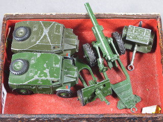 2 Dinky models of artillery tractors, 2 field guns and a limber