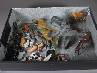 A box of various figures of metal animals