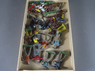 A collection of Cowboy and Red Indian figures