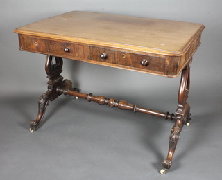 A Victorian rosewood library table fitted 2 drawers, raised on  lyre supports with H framed stretcher 41"w x 30"h x 28"d