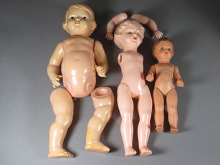 A 1930's styrene doll with articulated arms and legs, marked  WIDO 45 and 2 other dolls