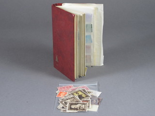 A stock book of various stamps