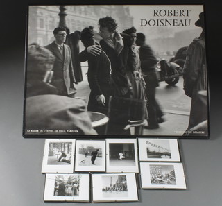 Robert Doisneau a 1950's black and white framed poster "The  Kiss" 24" x 31" together with 7 small images of "Paris" by  Doisneau 5" x 7"