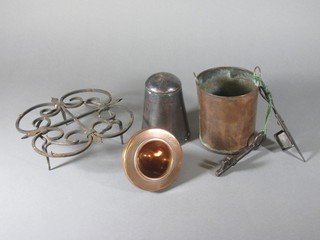 2 domed copper jelly/ice cream moulds, 1 marked Johnson &  Ravey, a copper pail, an iron key, pair of candle snuffers and a  trivet