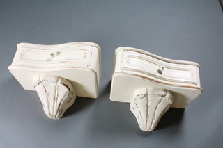 A pair of white painted Continental style shaped console brackets  fitted drawers 17 1/2"w x 13"d x 12"h