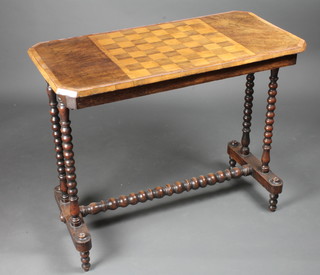 A Victorian lozenge shaped figured walnut occasional table, the top inlaid a chessboard, raised on turned supports with H framed  stretcher 34"w x 17"d x 28"