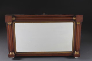 A 19th Century rectangular plate over mantel mirror contained in  a mahogany frame 34" x 20"