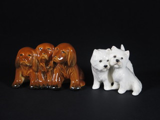 A Beswick figure of 2 West Highland Terriers 2" and a Beswick  figure group of 3 puppies 2"