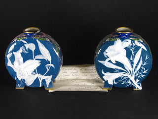 A pair of Minton porcelain moon flasks 6", 1 f, together with a letter from Henry Sandon dated 9.2.90