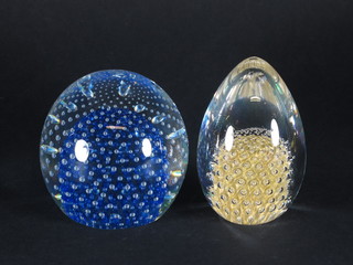 2 large glass paperweights 5"