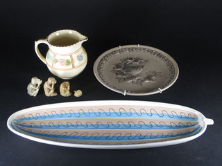 A Honniton jug with floral decoration 4", a Poole leaf shaped  dish 16", a circular Poole plate decorated a robin 8" and 3  Eastern stoneware figures of wise monkeys