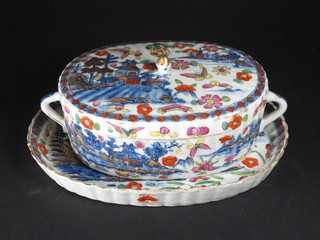 An Oriental oval twin handled tureen and cover with matching  stand 7"  ILLUSTRATED
