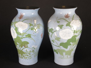 A pair of Oriental blue ground vases decorated flowers, the base  with seal mark 9"
